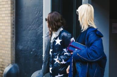 Two women looming down the street