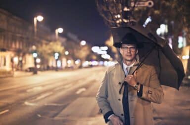 Man holding umbrella