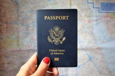 US passport over a map