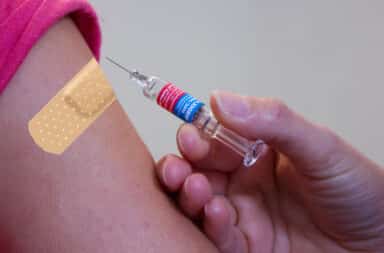 band aid vaccine needle arm