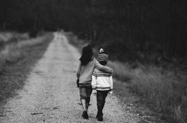 Children friends on a dirt road