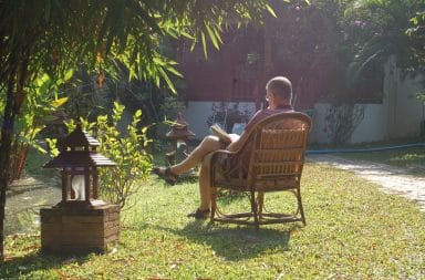 guy sitting in yard