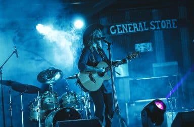 Country music woman singing on stage