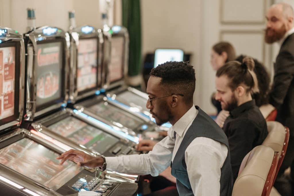 Man playing at a slot machine