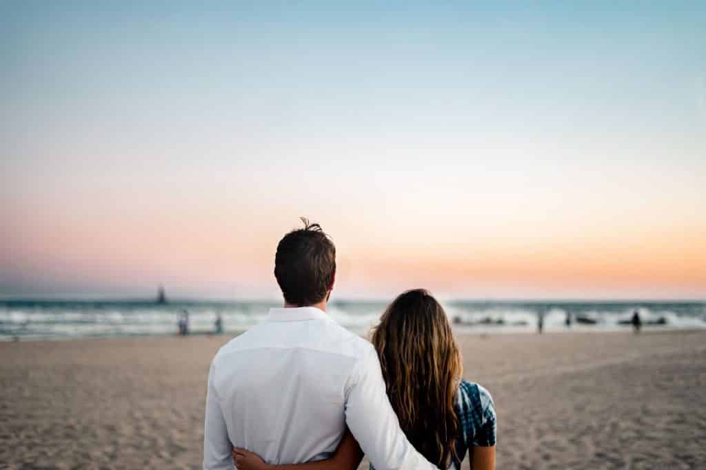 Couple hugging on the beach