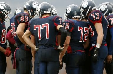 football team huddling