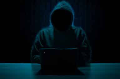 hacker computer robed mystery man