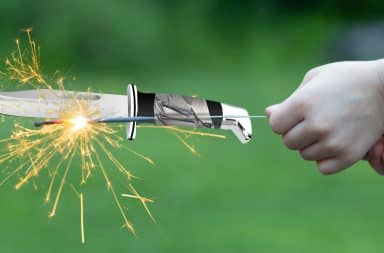 firework sparkler with a knife taped to it