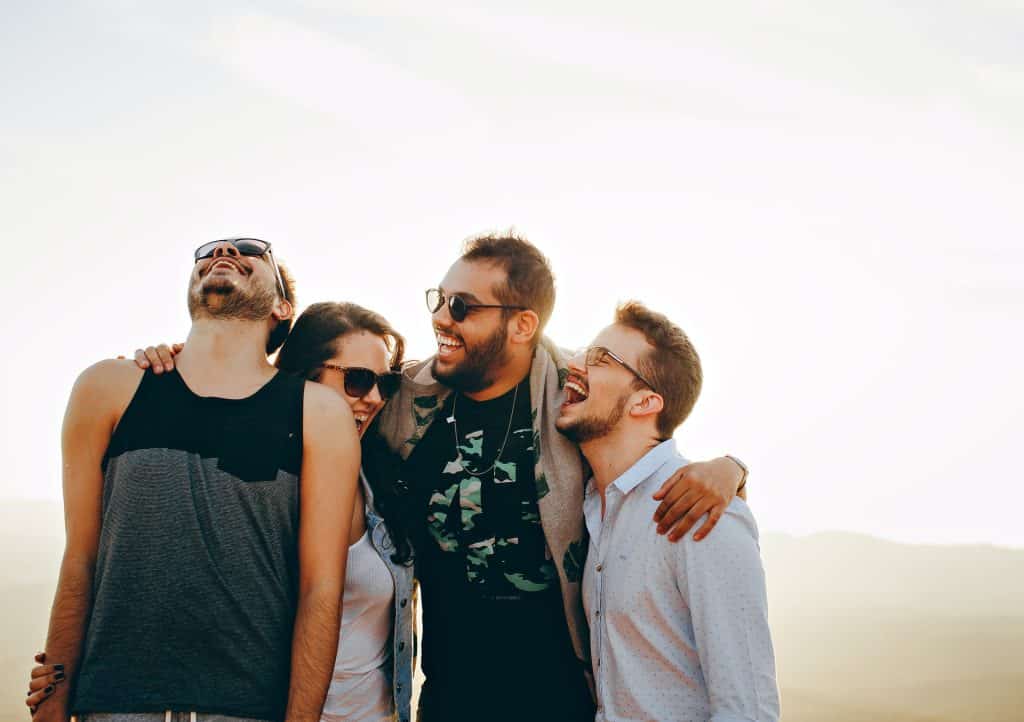 Men laughing outside