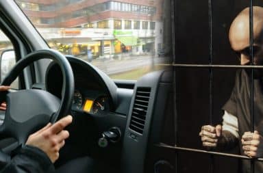 prisoner driving