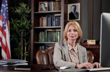 Lawyer a a desk with flag