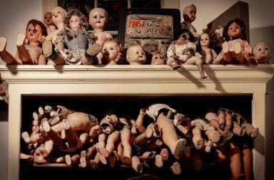 Wall of doll parts