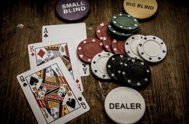 Gambling chips on felt table