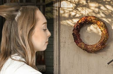 hair and a fall wreath