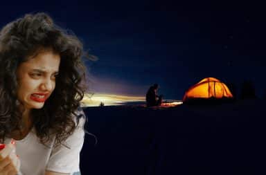 cringing woman looking at a tent