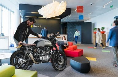 guy with a motorcycle in the office