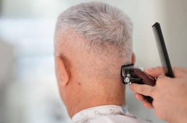 barber shaving a guy