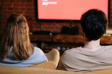 a couple watching TV