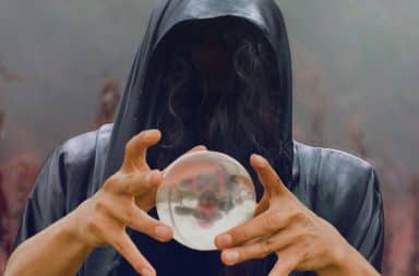 wizard looking at the orb