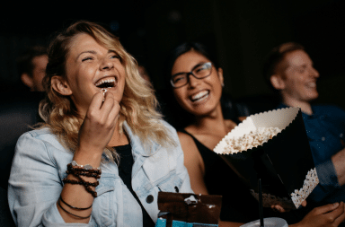 Eating popcorn at a movie