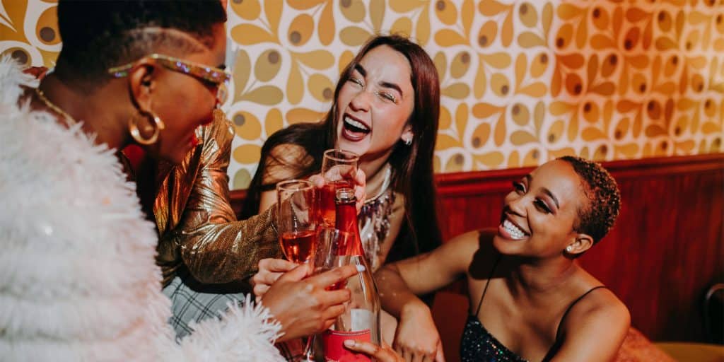 friends laughing over some drinks