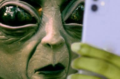 alien sending a text message