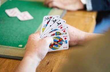 Playing cards in hand