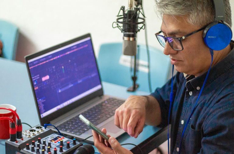 man podcasting