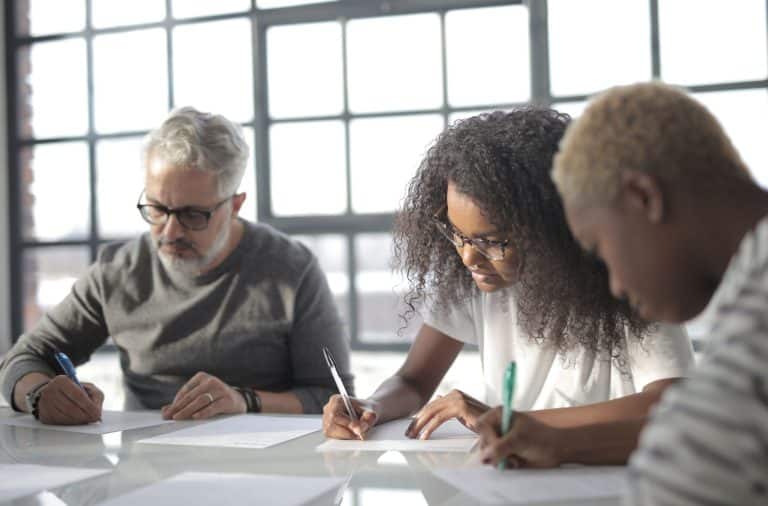 friends writing a note